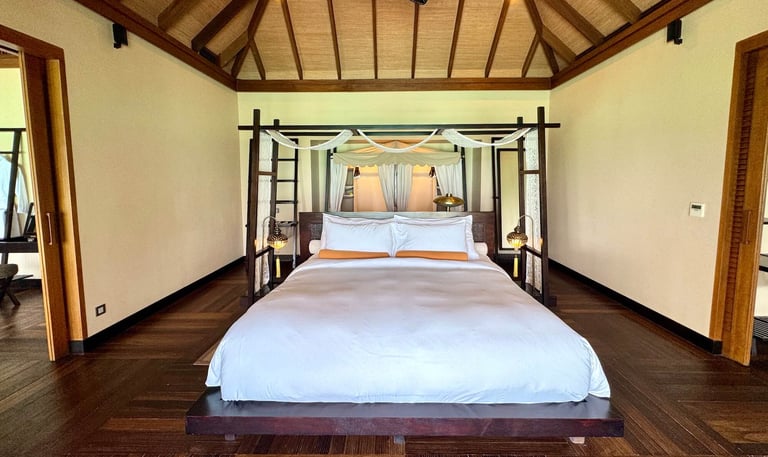 Ayada Maldives sunset ocean suite with pool bedroom