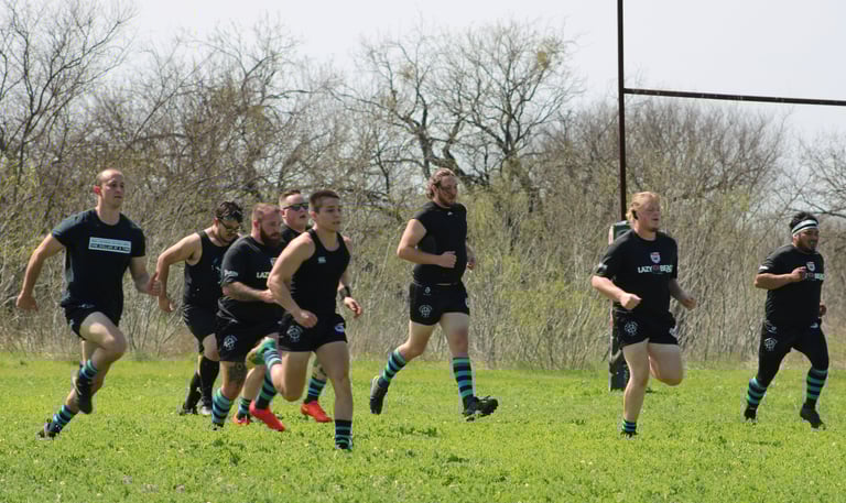 a group of men and women playing a game of rugby and running