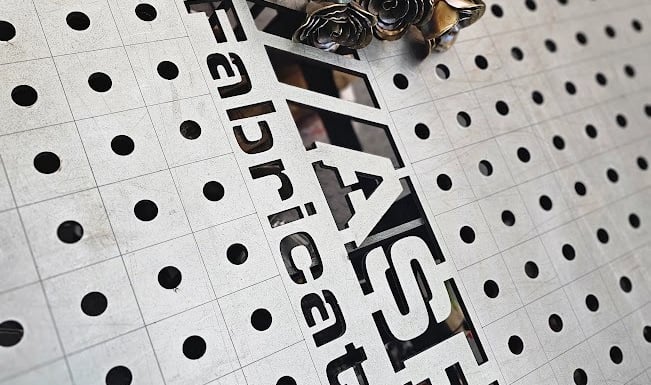 a bunch of flowers on a CNC plasma cut table