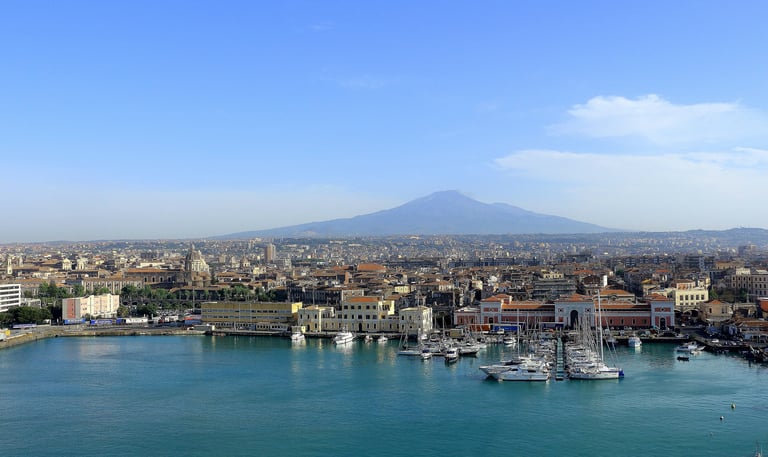 Cantania harbor with Mt. Etna in distance