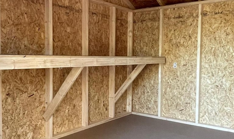 Custom shed with interior workbench built in Massachusetts and Rhode Island for added functionality.