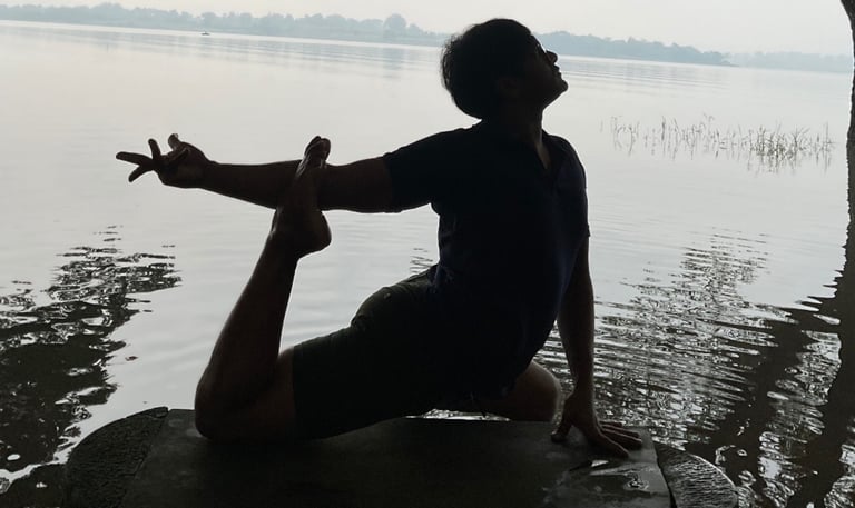 Umesh Balavaradaraju conducting an open-air yoga session, his popular workshop yoga with dance