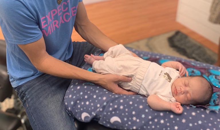 Safe, gentle chiropractic adjustment for newborns in Franklin, TN to ease colic, gas, and fussiness.
