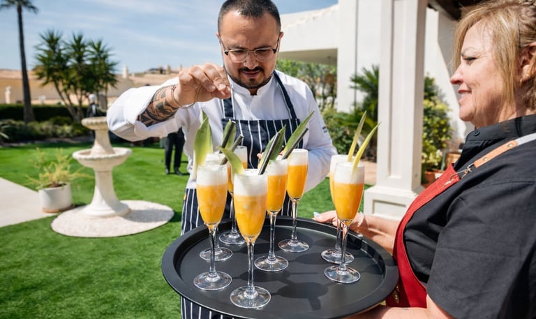 Chef finishing cocktails for a private event with personalized service