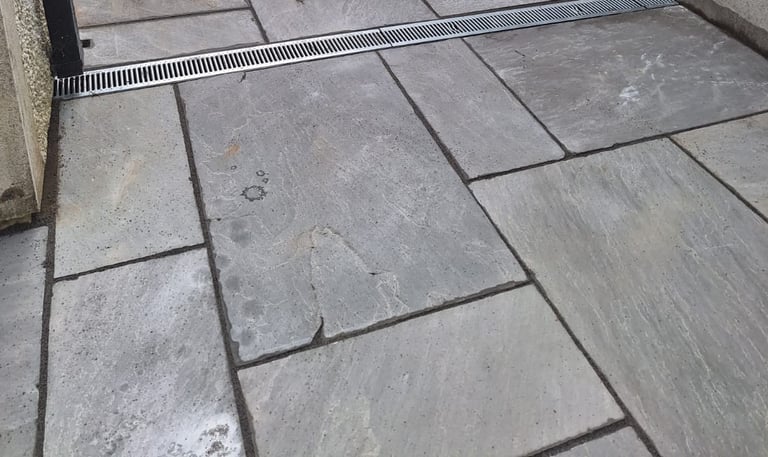 I freshly tiled ground with neatly fitted drains
