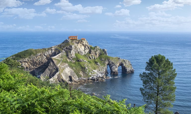 Coast off of Bilbao Spain with house on rocks