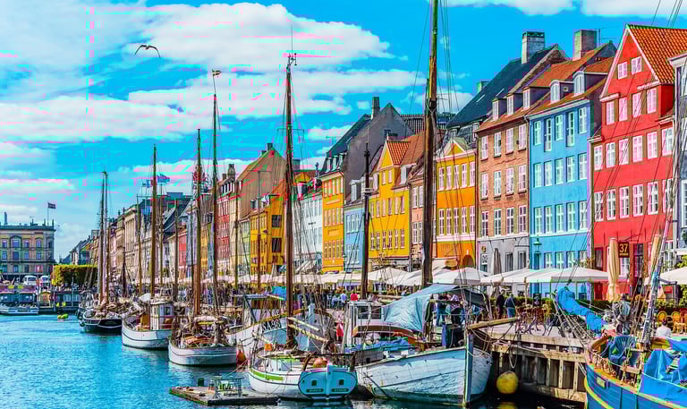 Copenhagen denmark boats Infront of bright colored houses