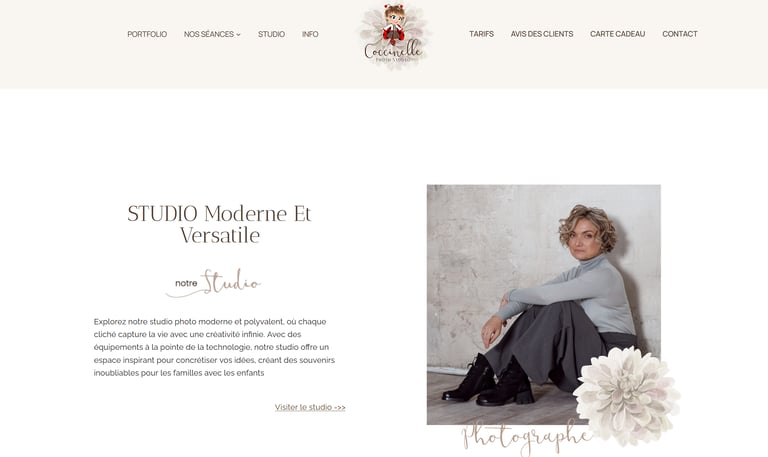 Professional woman posing for a portrait in a modern photography studio.