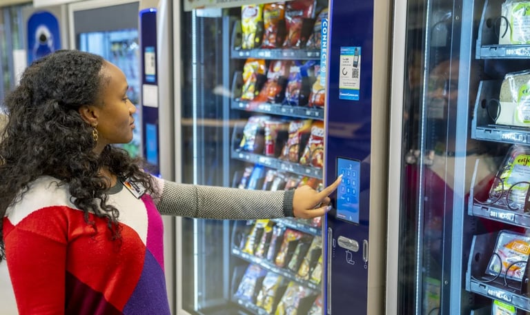 Person using snack machine