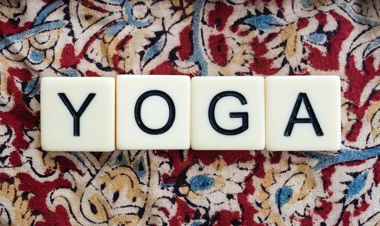 a yoga block with the word yoga on it