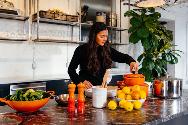 a lady over 40 years old preparing a wholesome meal