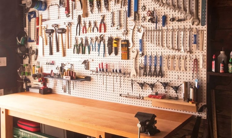 a workbench with tools and tools on it