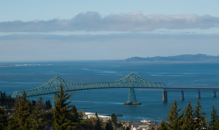 Astoria, Oregon overlooking water with bridge
