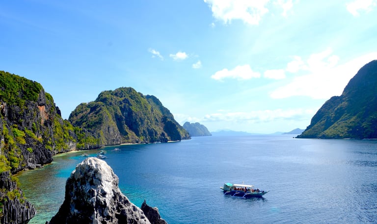 Palawan Beach with boat and peaks