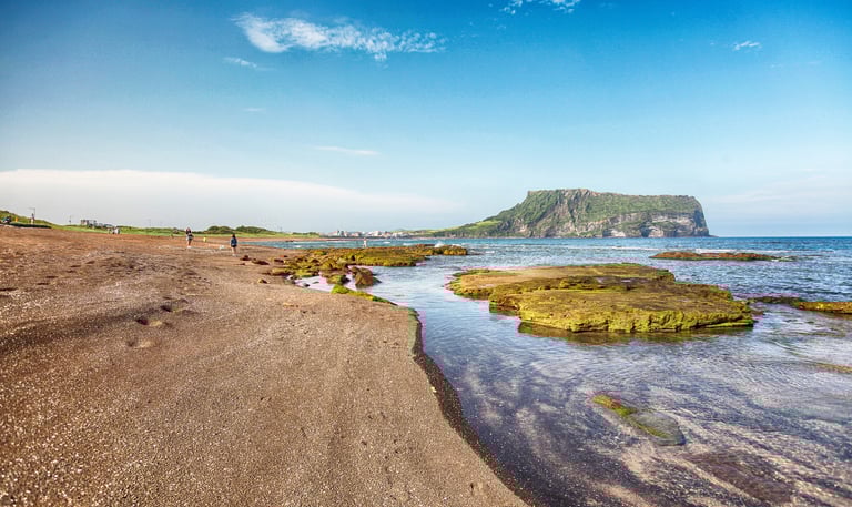 Jeju Island overlooking water and rocks