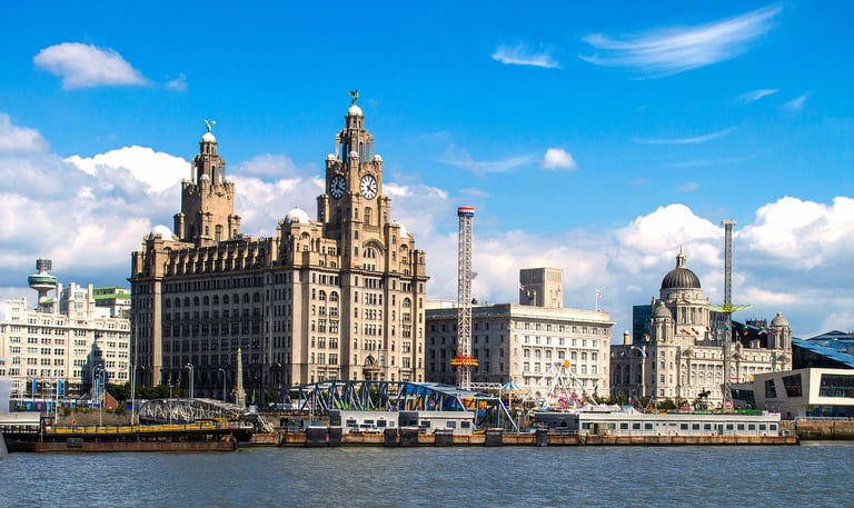 Liverpool waterfront wit buildings and amusement rides