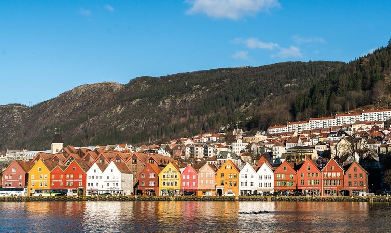 bergan Norway buildings Infront of water with mountain backdrop