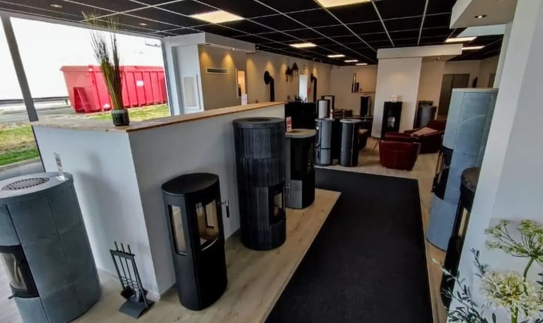 a room with a fireplace and a black carpet