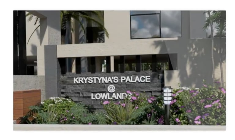 Building sign reading "KRYSTYNA'S PALACE @ Lowlands" at entrance of commercial property real-estate