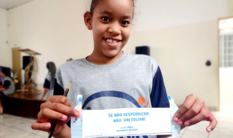 a young girl holding a sign that says, it's not a sign