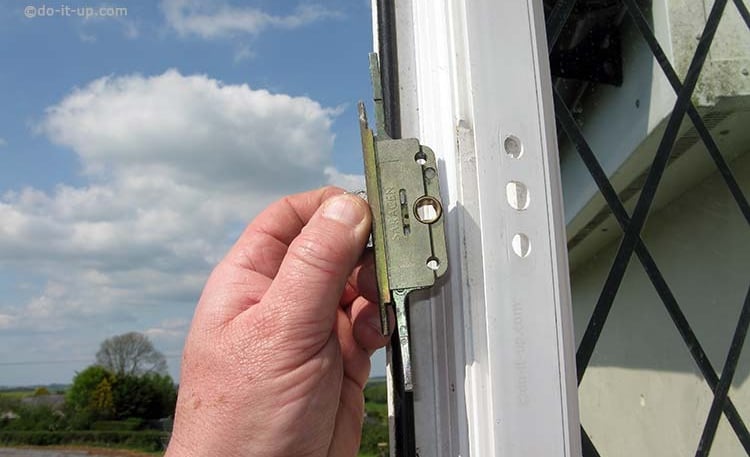 picture of a upvc window lock being replaced