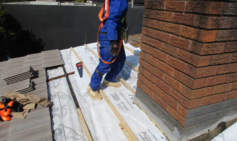 Chimney area precision batten work laying to accommodate new roof tiles, Hyde Park, Sandton