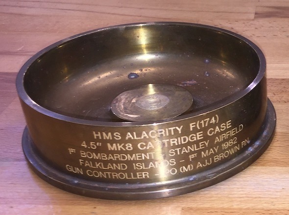 a metal gun shell case from FGalkland Islands engraved