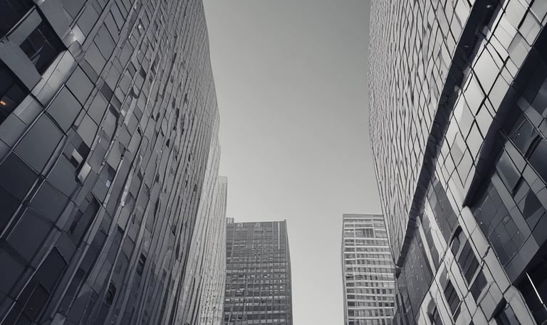 A professional reviewing property documents with clients in a modern office.