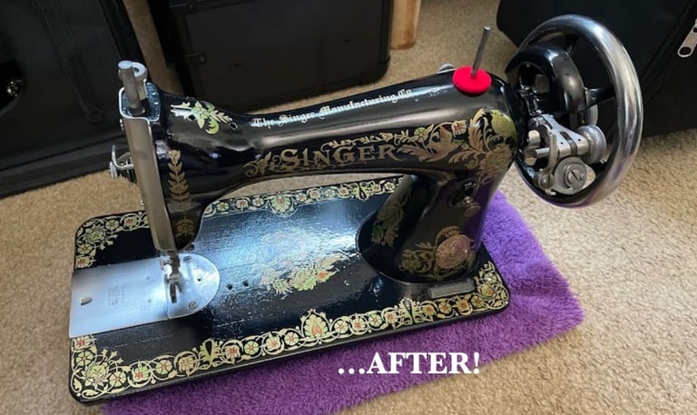 Vintage Singer 15 sewing machine with Pheasant decals resting on a purple cloth after restoration.