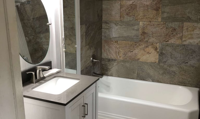 bathroom with tile shower