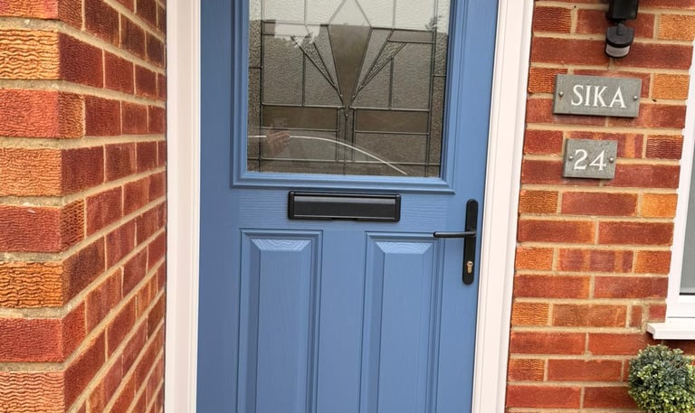 Pigeon Blue Composite Door Installed Near Hythe, Southampton - blue capri 1 composite front door with black hardware