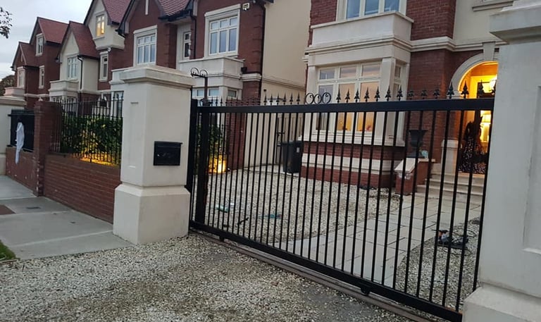 sliding gates in front of a house