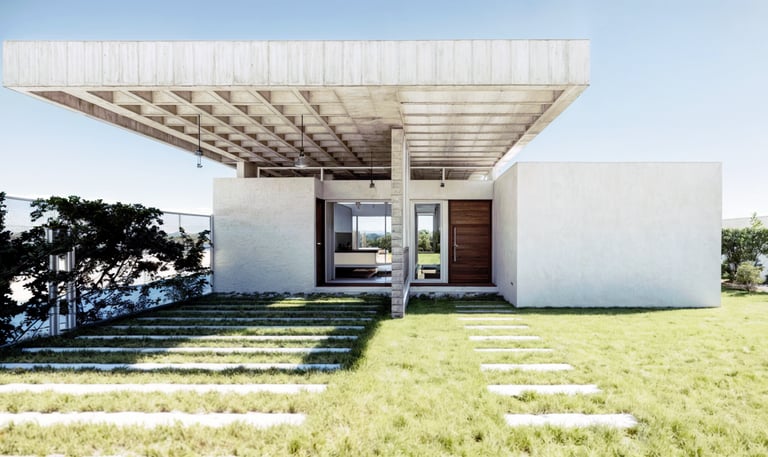 Una casa moderna, con un gran techo voladizo. sobria. minimalista. Arquitectura con sentido.