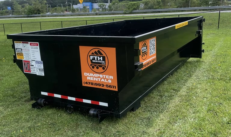 Dumpster rental in Forsyth, GA — roll-off placed in residential yard