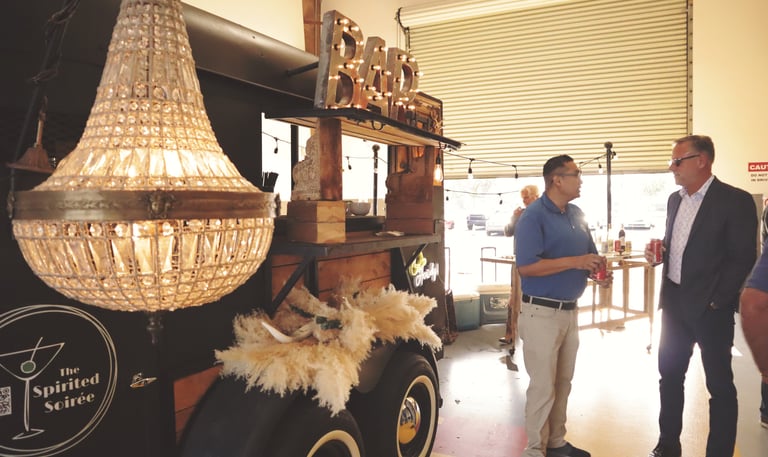 Horse Trailer Bar with men in front