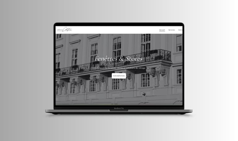 Laptop displaying a modern website design for a French window and blind installation service.