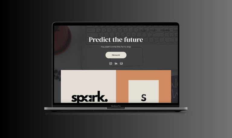 Modern MacBook Pro displaying a creative agency website design with Spark branding and minimalist UI.