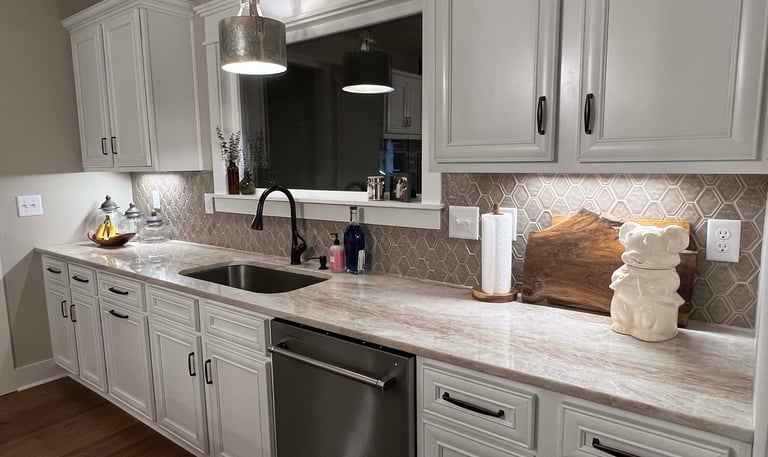 Marble top in custom-built bathroom with modern fixtures