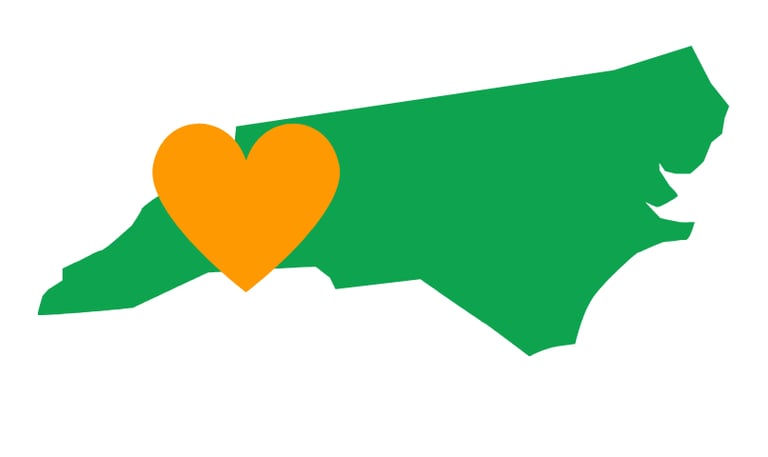 Green NC and orange heart over WNC representing Jack’s Locksmith local and reliable services in Marshall, NC