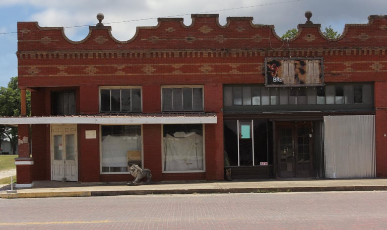 Water damage restoration in Granger, TX home with standing water on hardwood floors