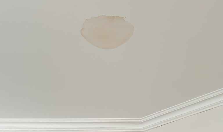 Water damage restoration in Manor TX home after flooding and roof leak