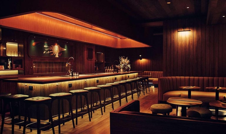 Double Chicken Please – Sleek cocktail bar with innovative, culinary-inspired drinks.