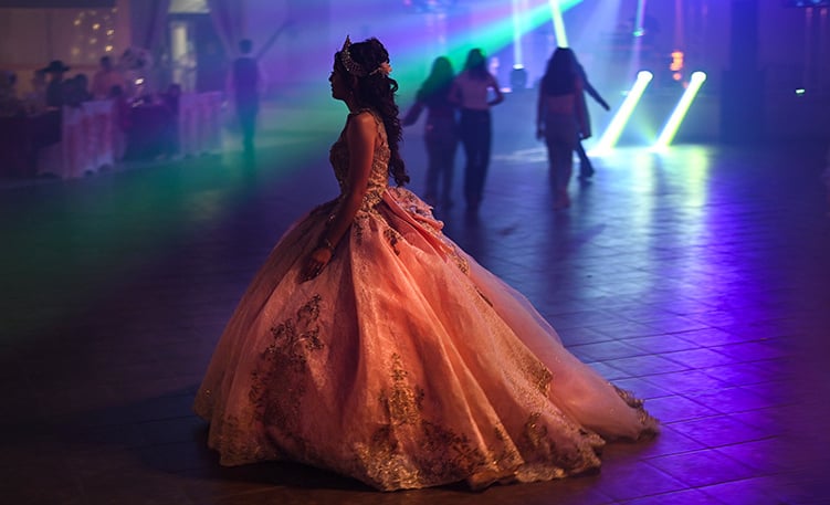 a woman in a dress with a long dress