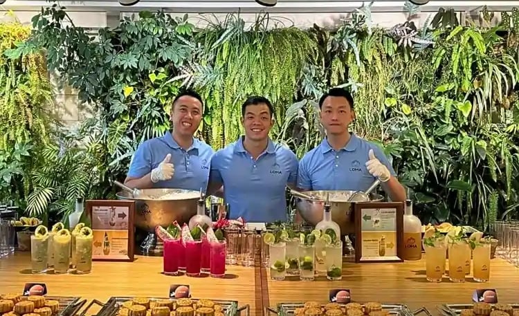 Loma mixologist team serving a menu of Signature cocktails at a Hong Kong corporate event.