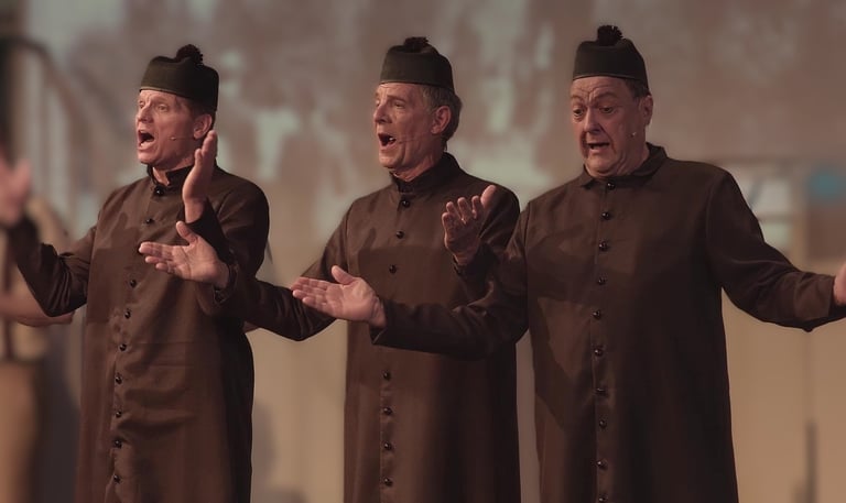 Three Priests from a Jesuit college. central to the story, energetically recruit sutdents.