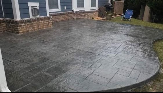 a patio with a patio with a concrete patio with a concrete patio with a concrete