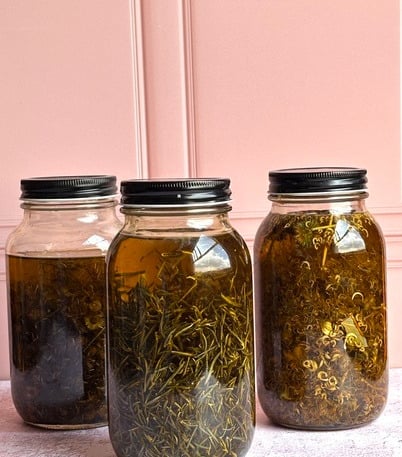 Aceites Puros de olivo macerado con flores secas