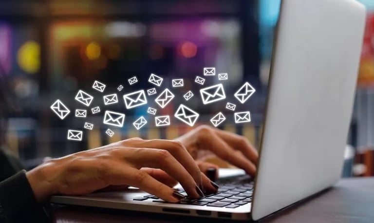 Woman sending and receiving emails 