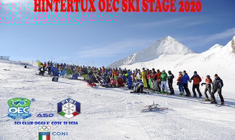 a group of people standing on a snowy slope