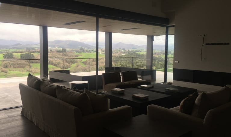 a living room with a couch and a table